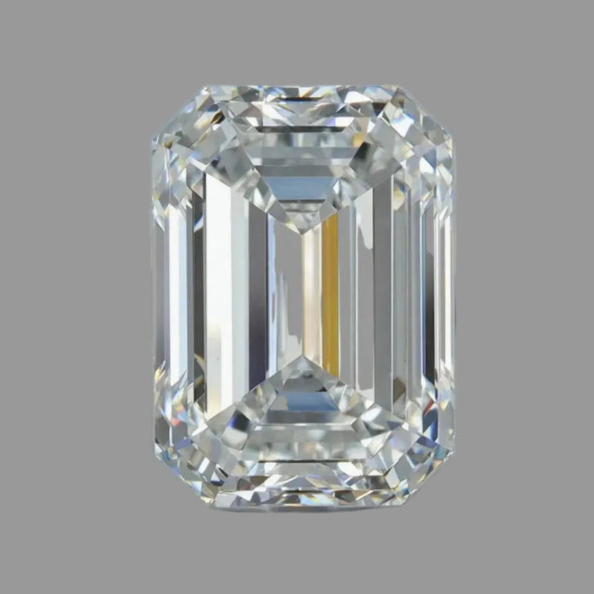 Emeraldcut diamond on a gray background