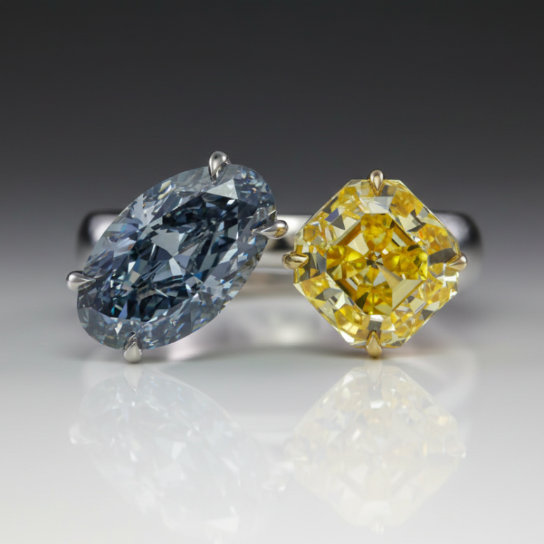 FANCY DARK GRAY-BLUE OVAL AND fANCY VIVID YELLOW on a dARK GRAY BACKGROUND