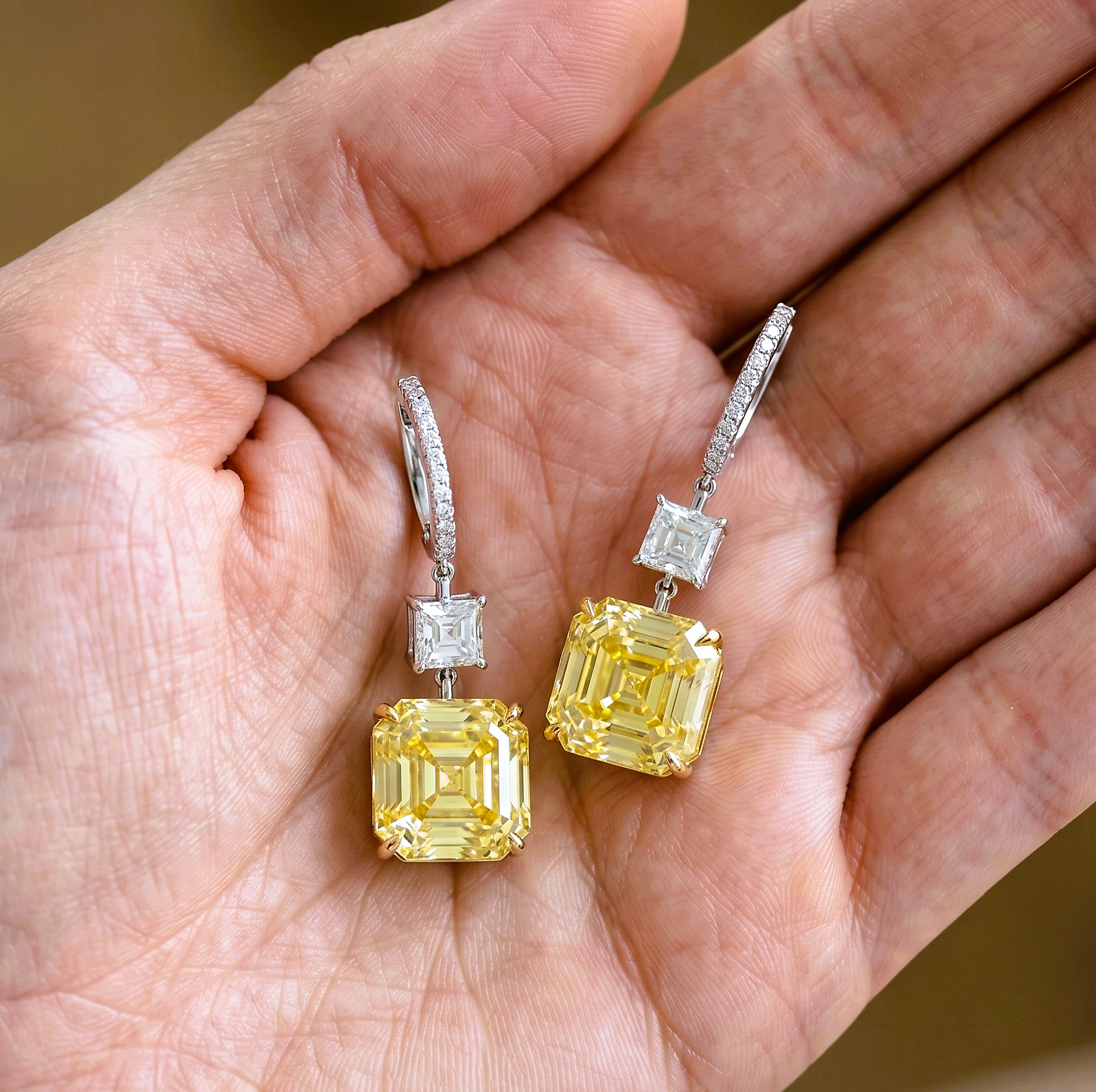 10.26ct TW Matched Pair Fancy Intense Yellow Asscher Cut Diamonds
